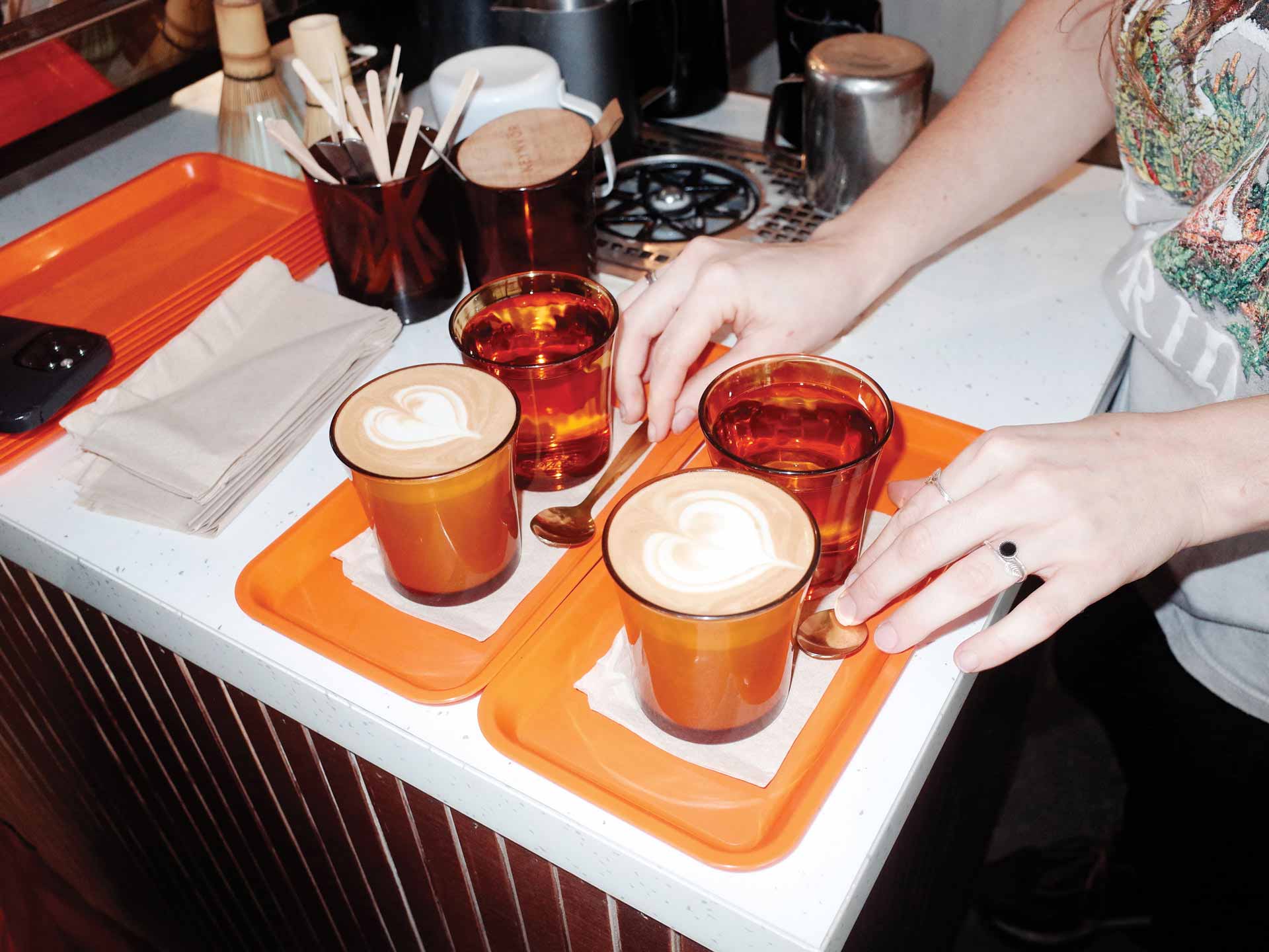 flat whites being served in a cafe